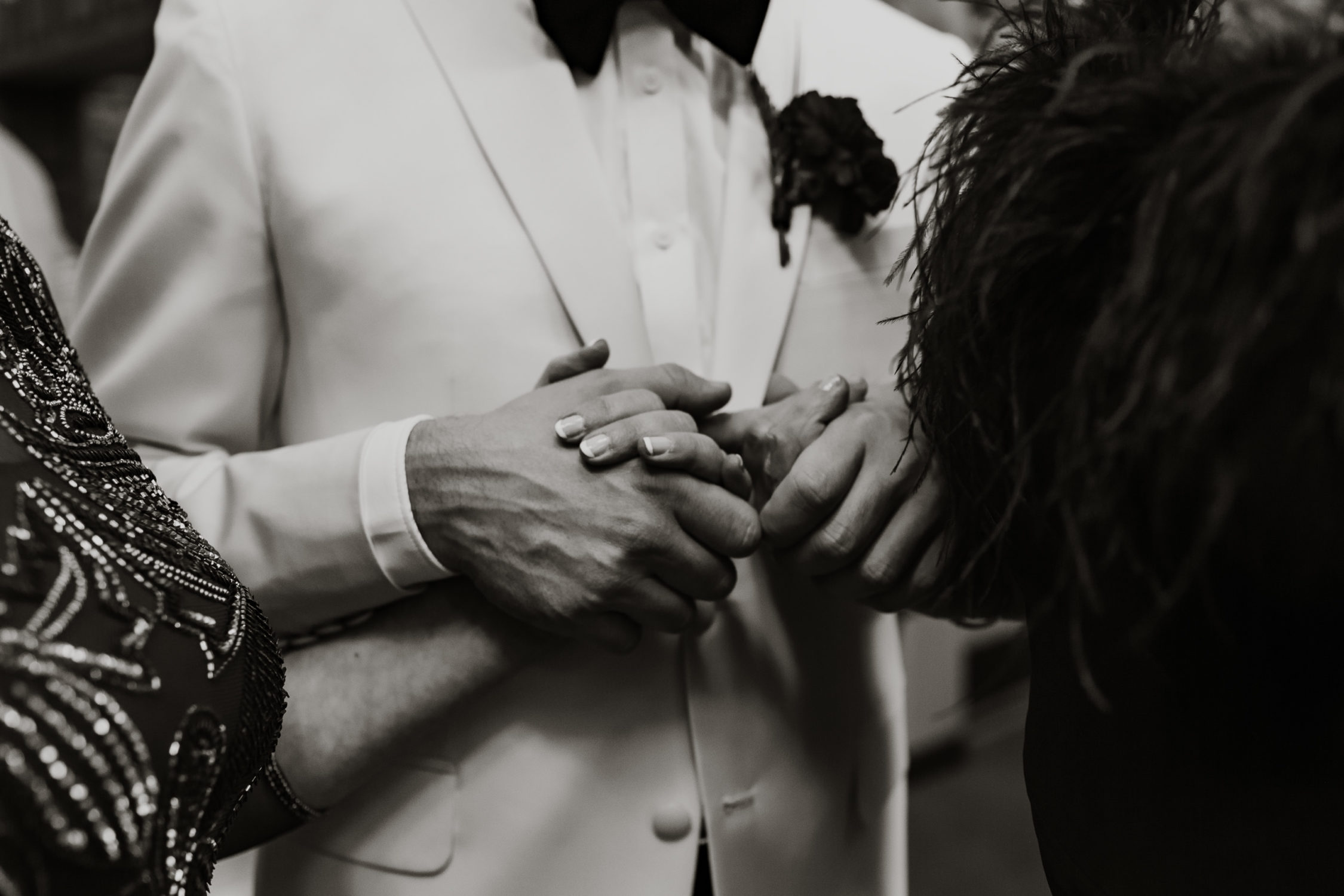 groom holding mothers hand